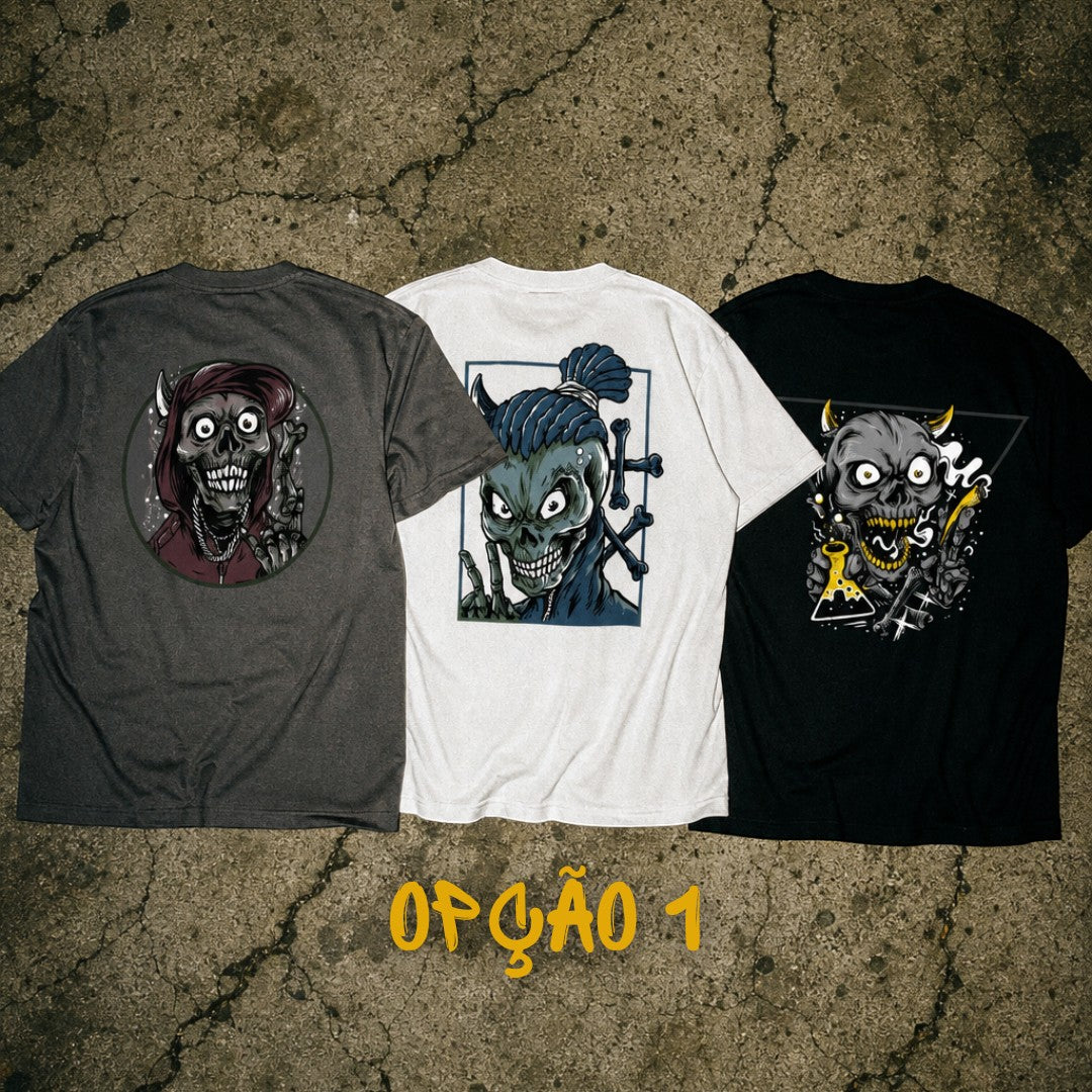 Pack de três t-shirts astredik com estampados de caveiras estilo hip-hop em tons cinza, branco e preto